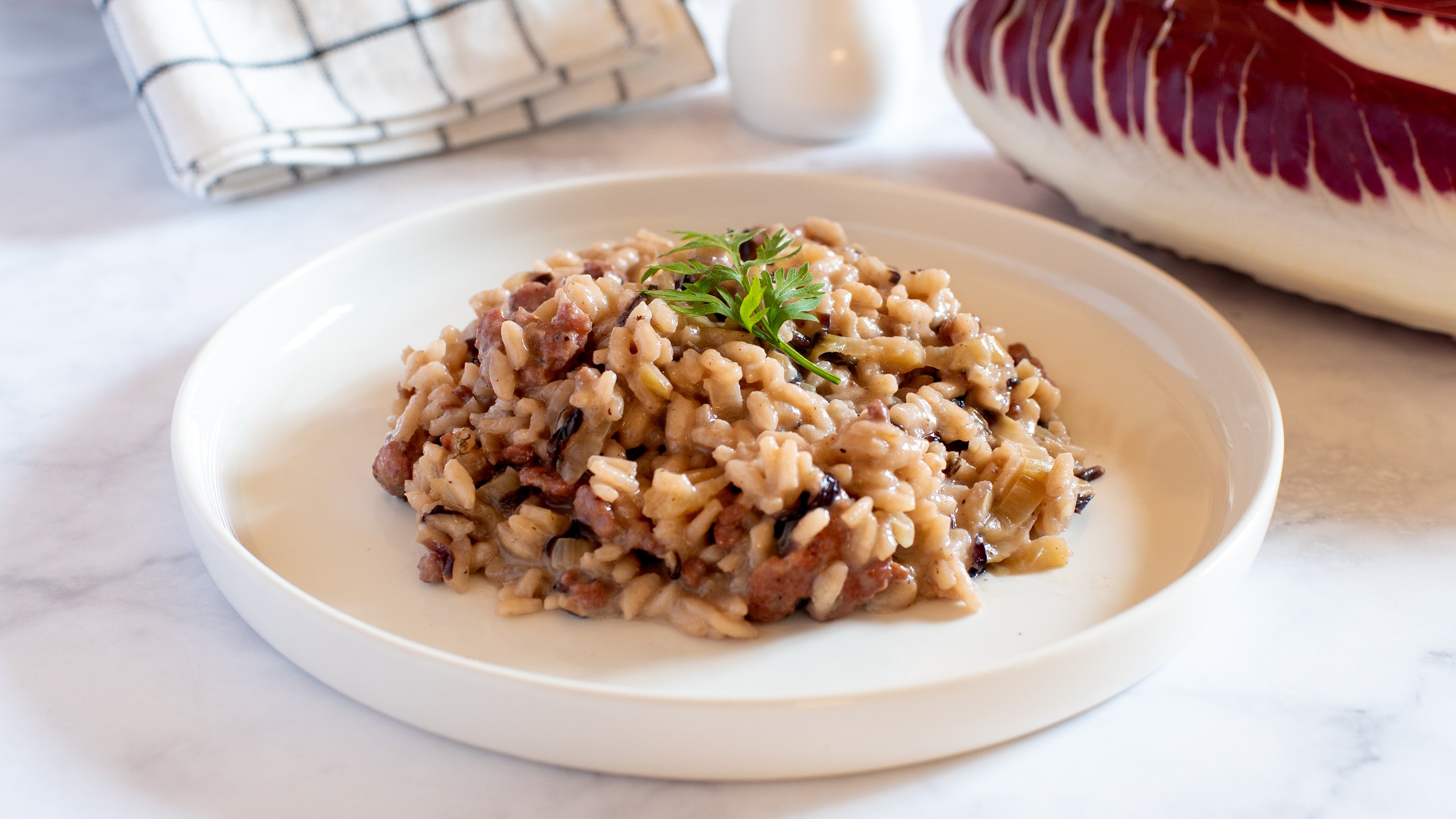 Risotto mit rotem Radicchio und Wurst