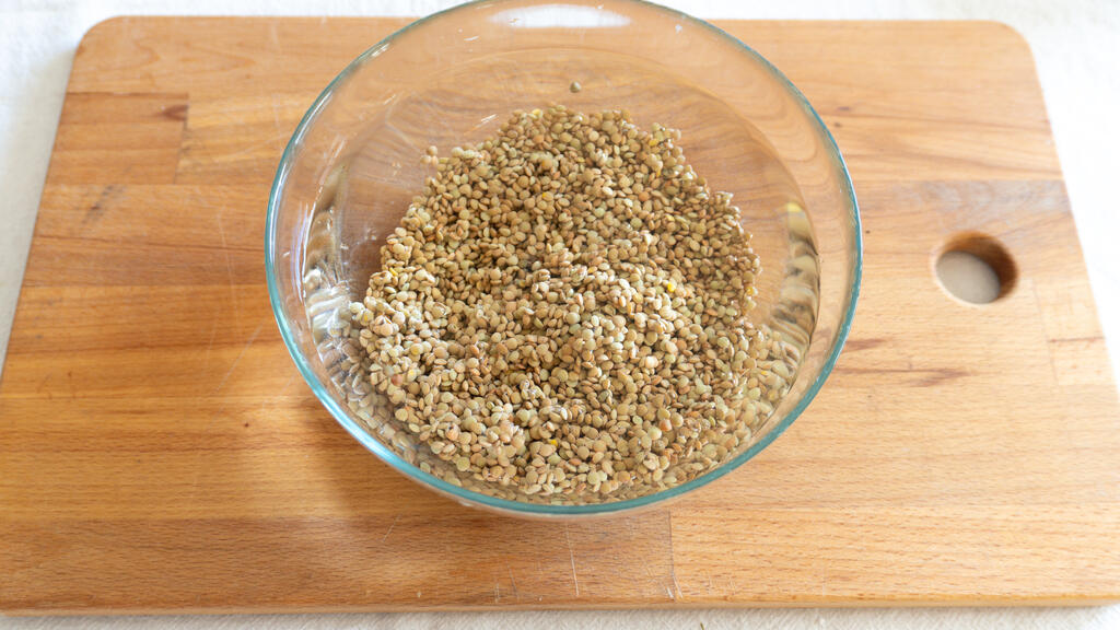 Cotechino vom Grill mit Linsen