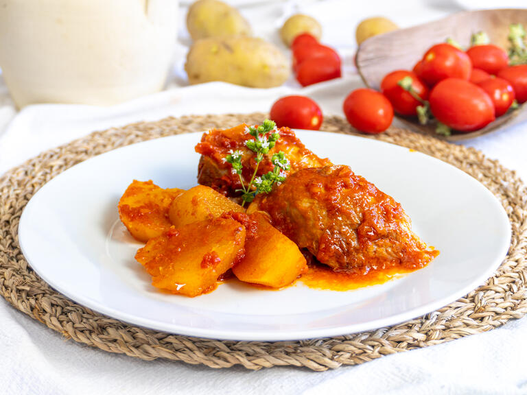 Slow-cooked braised turkey legs are a succulent an...