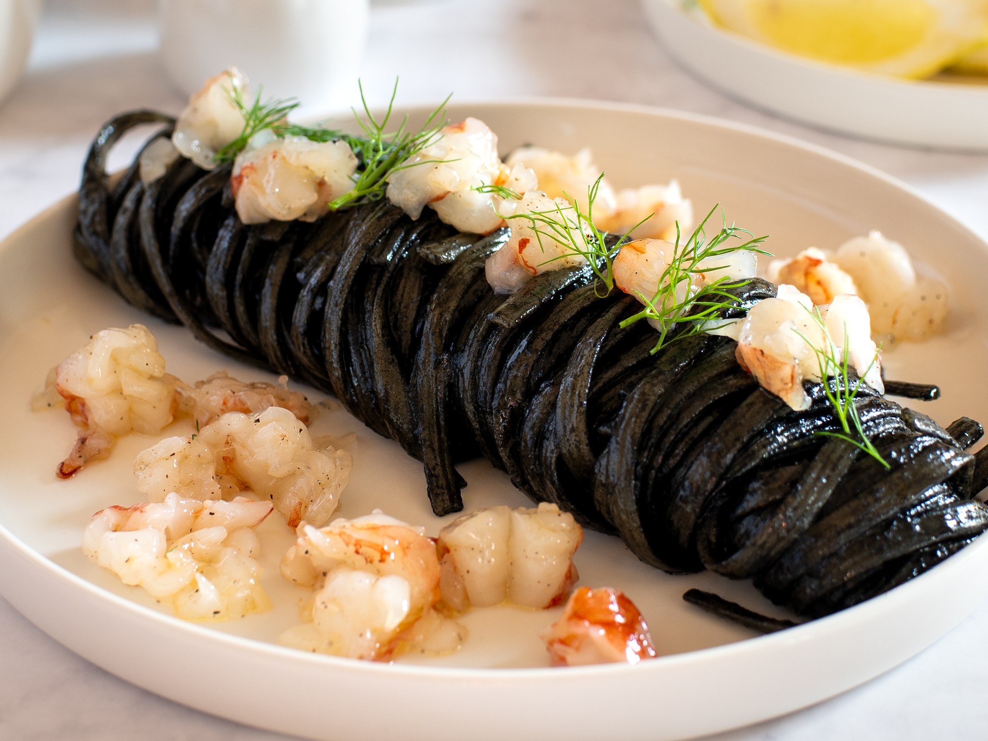 Pasta with squid ink and shrimp