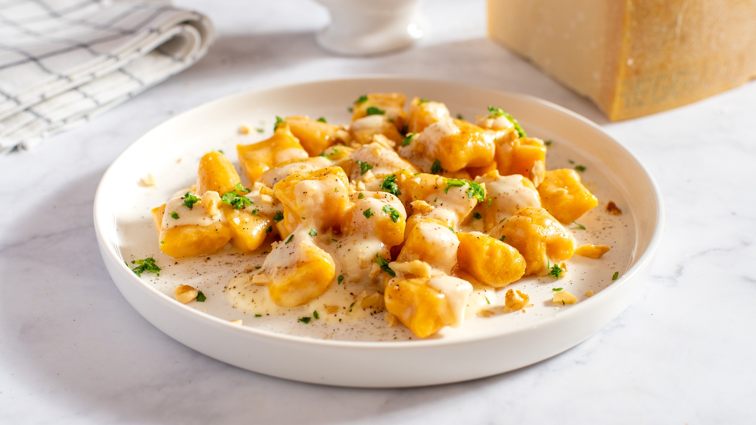 Gnocchis de courge à la fondue de parmesan