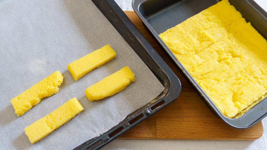 Bastoncini di polenta al forno