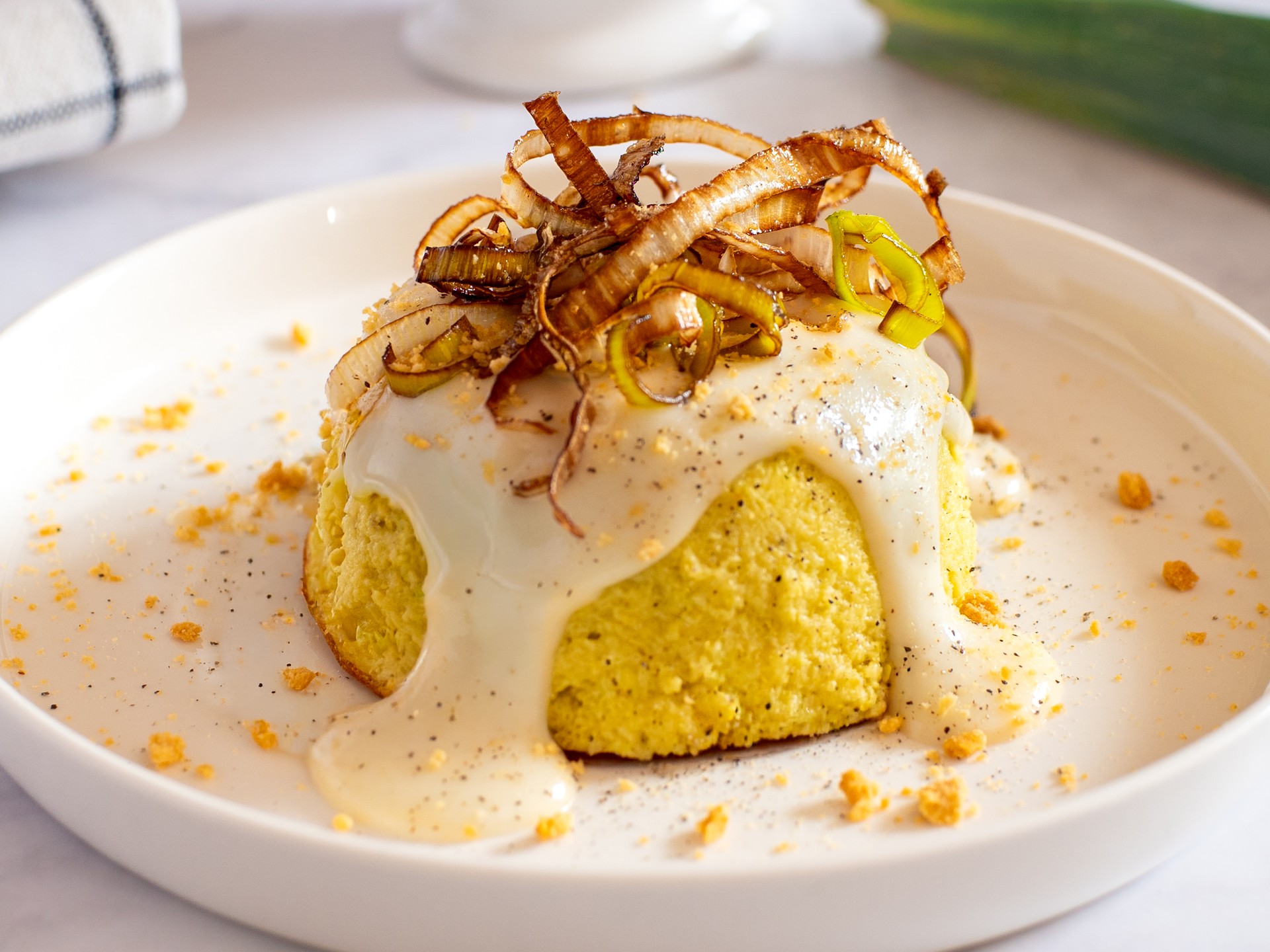 Flan di porri con fonduta di parmigiano