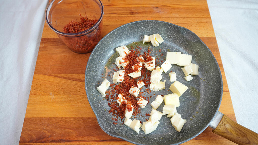 Gnocchi di zucca con taleggio e speck - passo 7