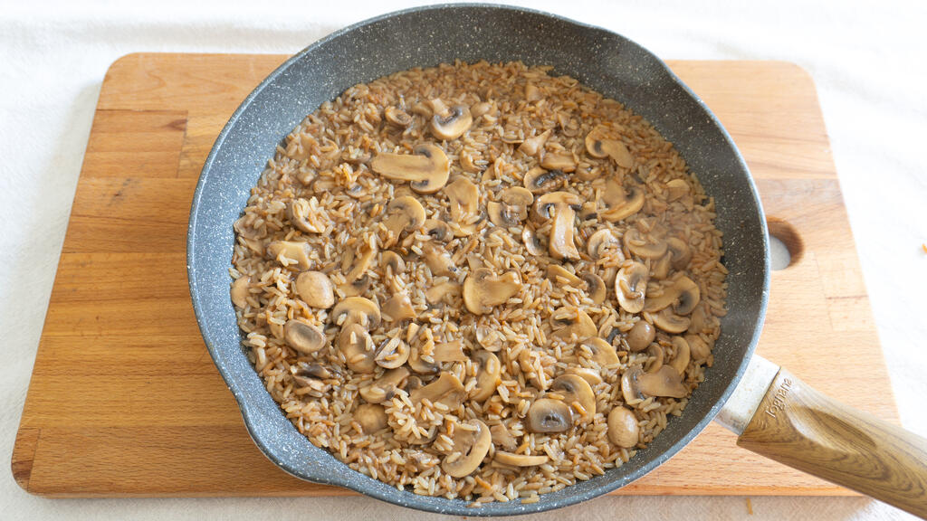 Risotto al liquore porto e funghi - passo 5